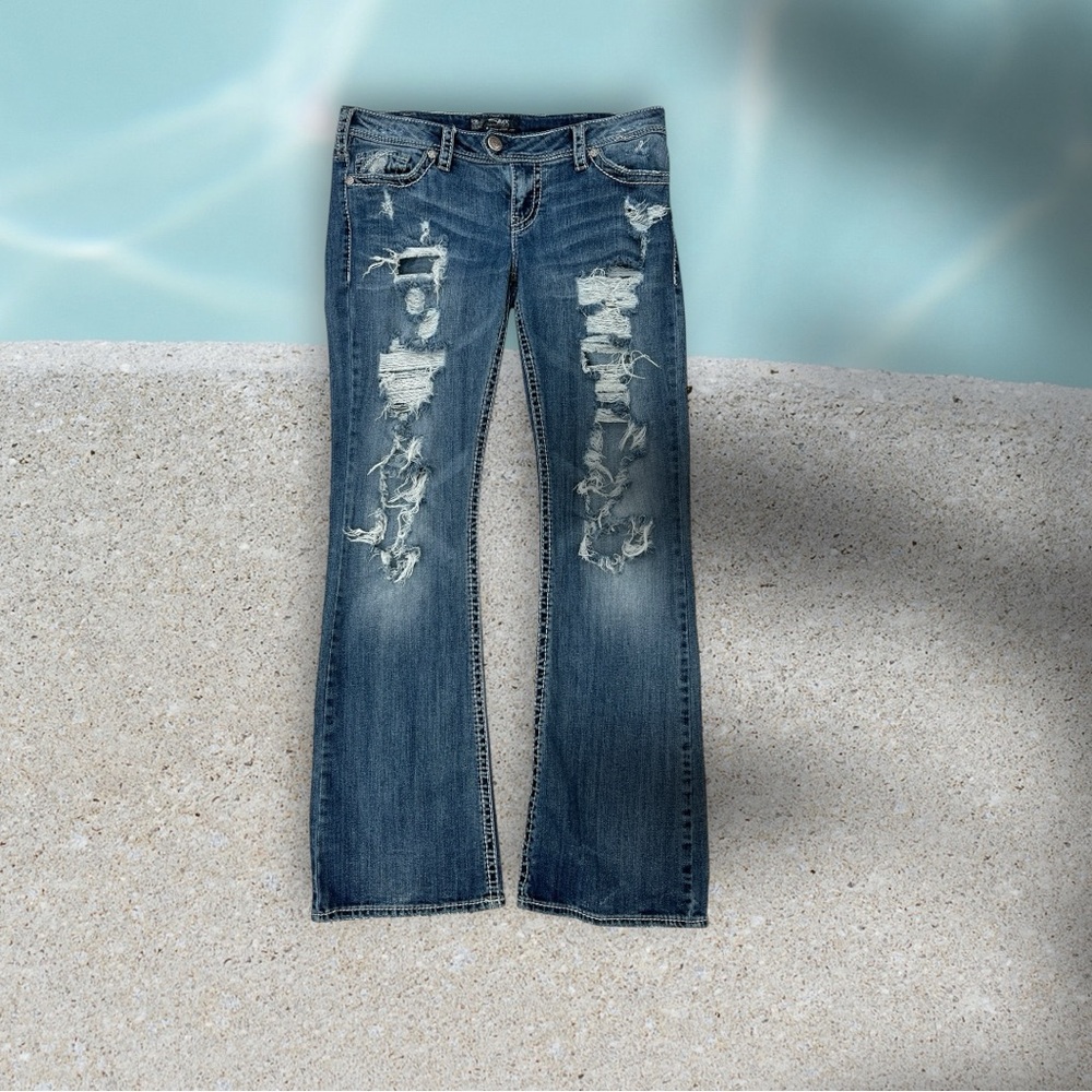 Distressed Blue Jeans